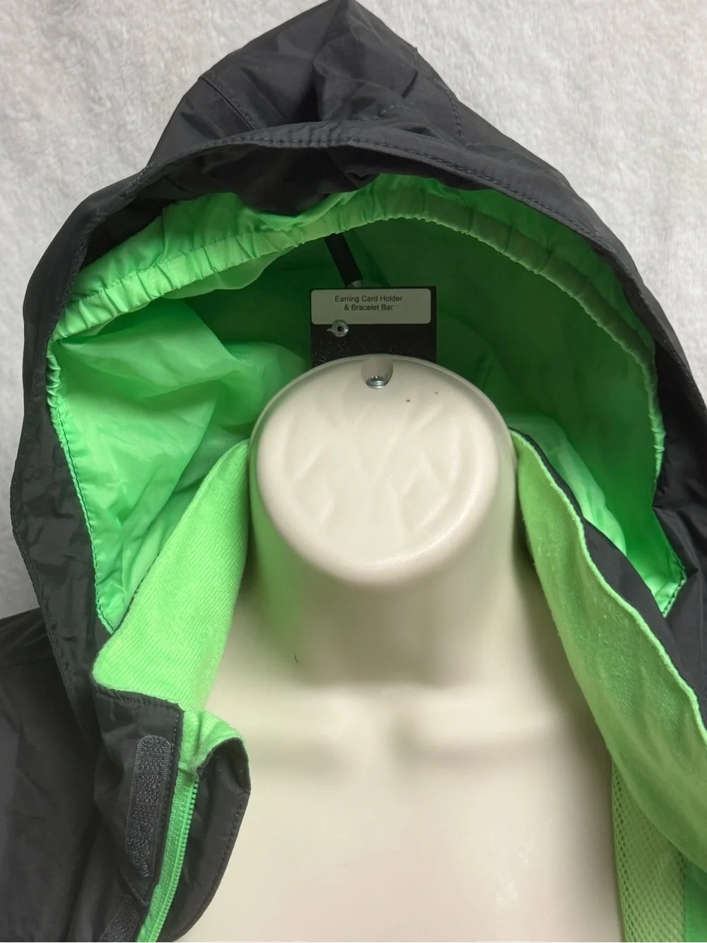 The North Face Kids Black Raincoat with Neon Green Lining